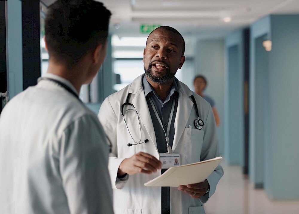 doctors chatting in corridor