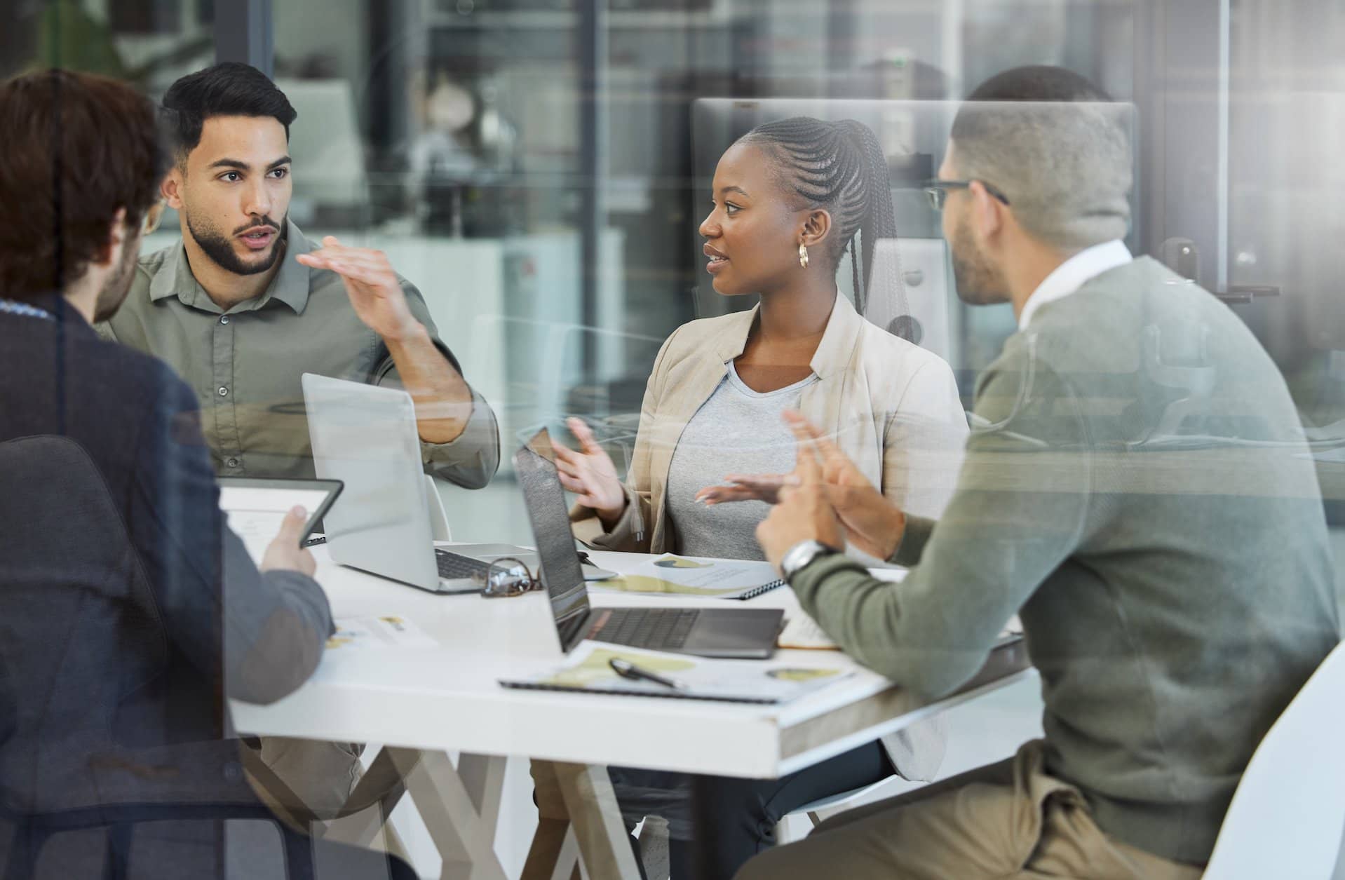 brand-people-in-a-meeting-with-laptops