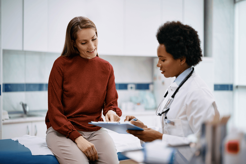 Doctor with a patient on an examination table