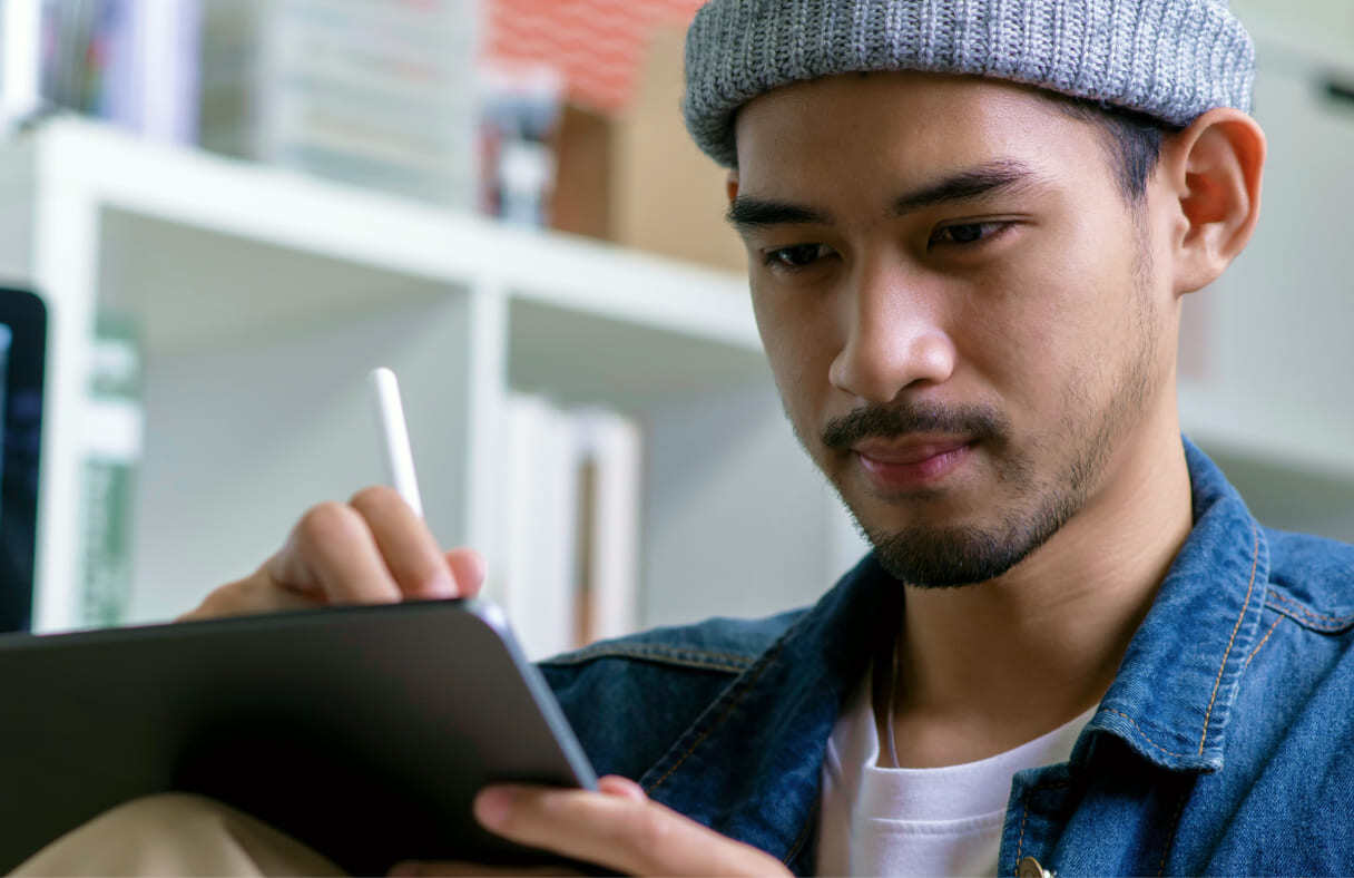 man-working-on-ipad