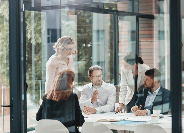 team-collaboration-meeting-room-glass-windows