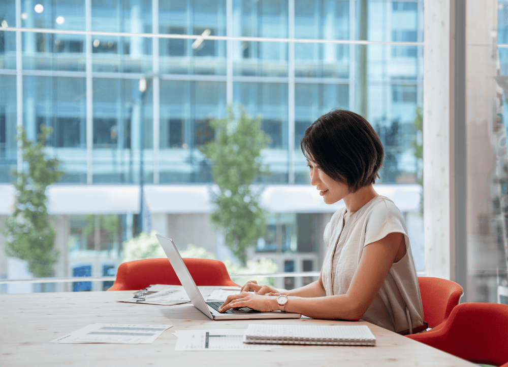 Clinical research professional using a laptop, concept for Viedoc EDC software in early-phase clinical trials