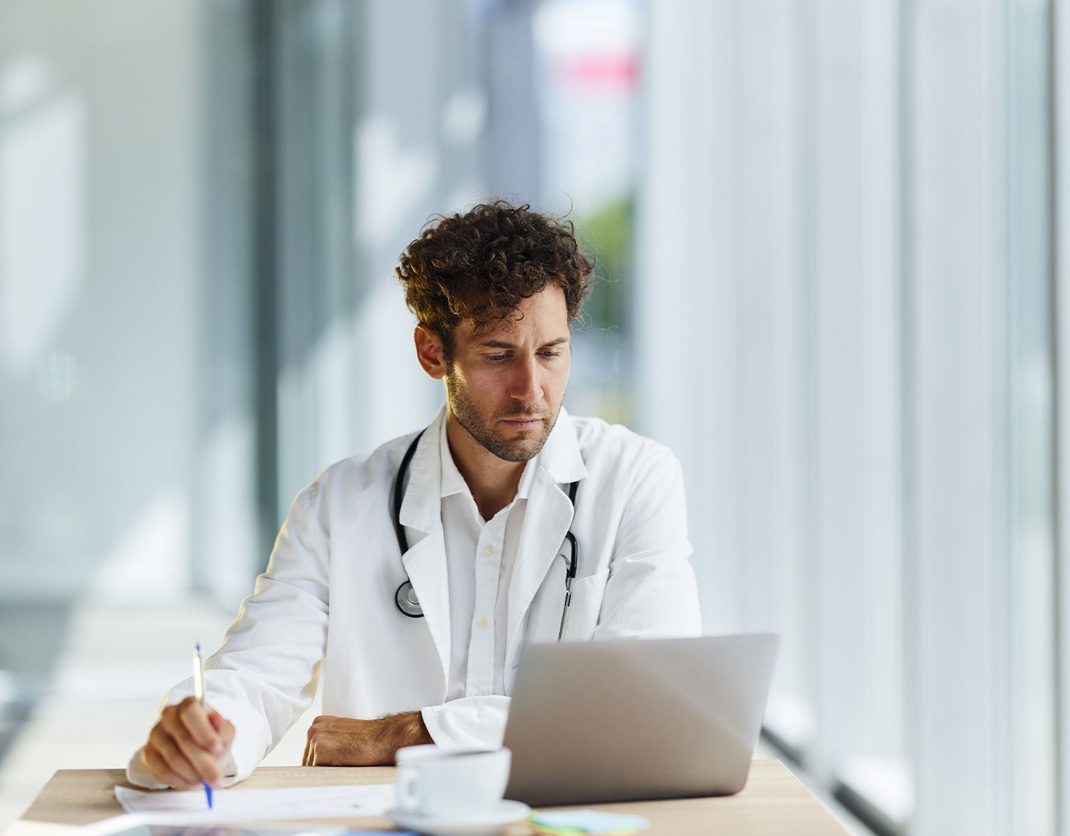 dermatology studies man in white coat
