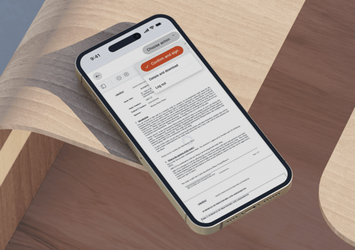 Smartphone on a desk displaying a Viedoc document