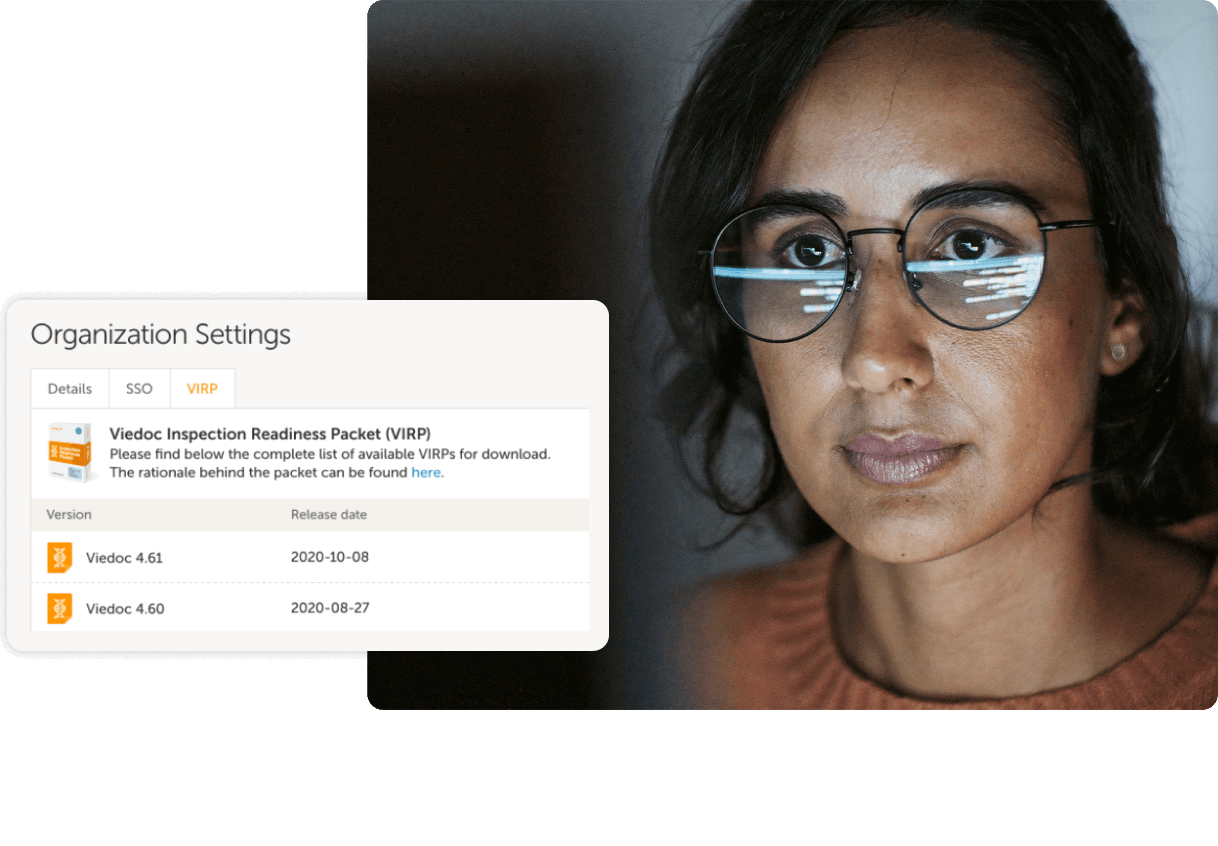 woman looking at monitor in dark room with VIRP download UI