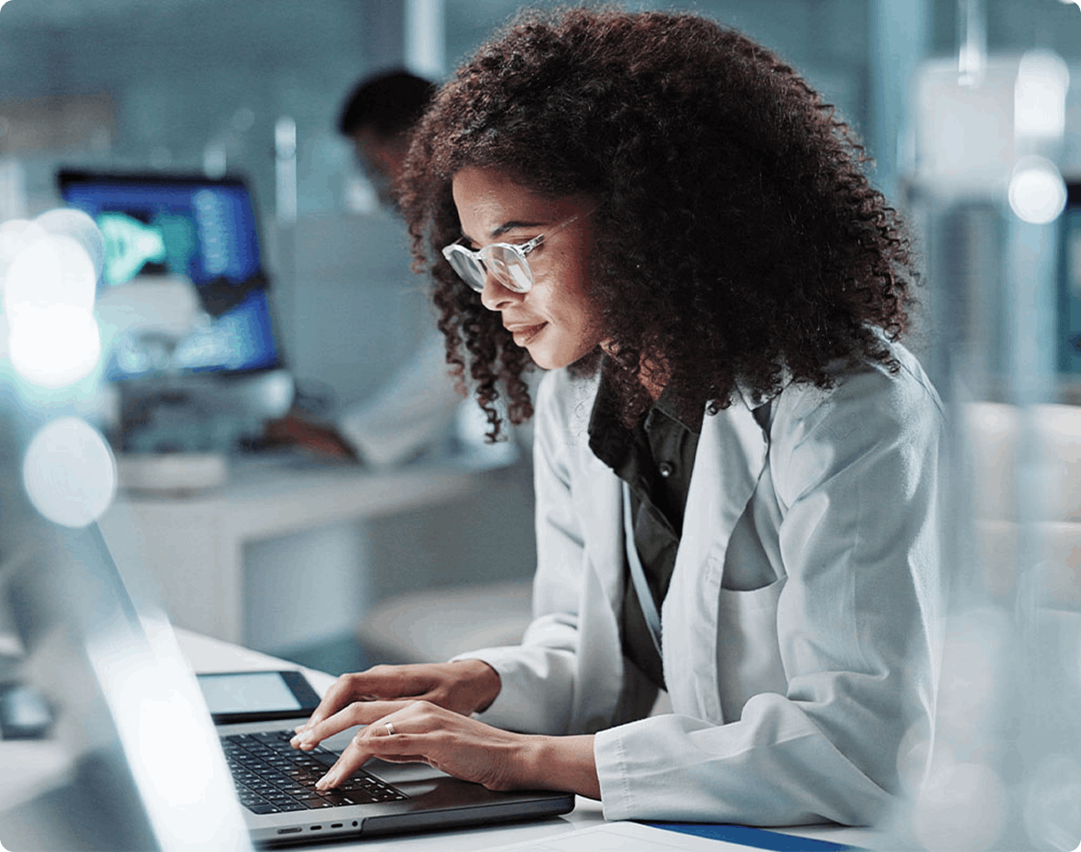 woman using laptop in lab