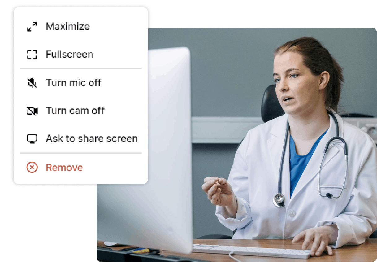 woman in labcoat looking at computer monitor with Viedoc connect controls